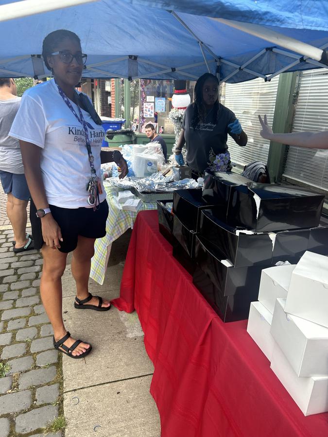 Volunteers preparing boxed meals to hand out at the relief drive.