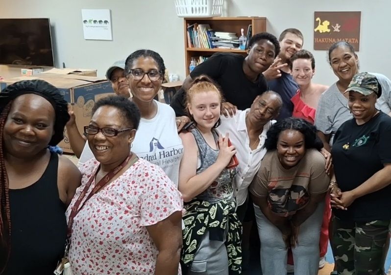 Tia's Closet volunteers gathered together inside the donation center.